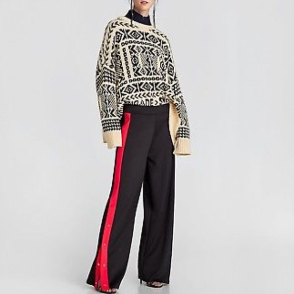 Wide leg pants with buttoned side stripe